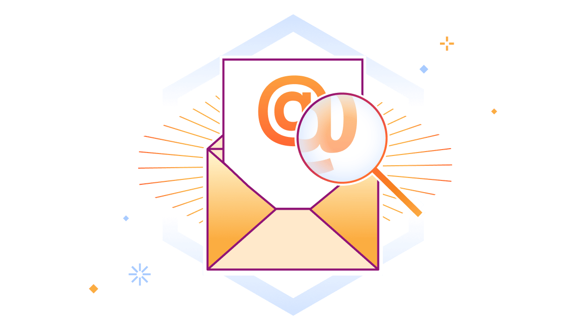 Sinal de e-mail @ ampliado por uma lupa
